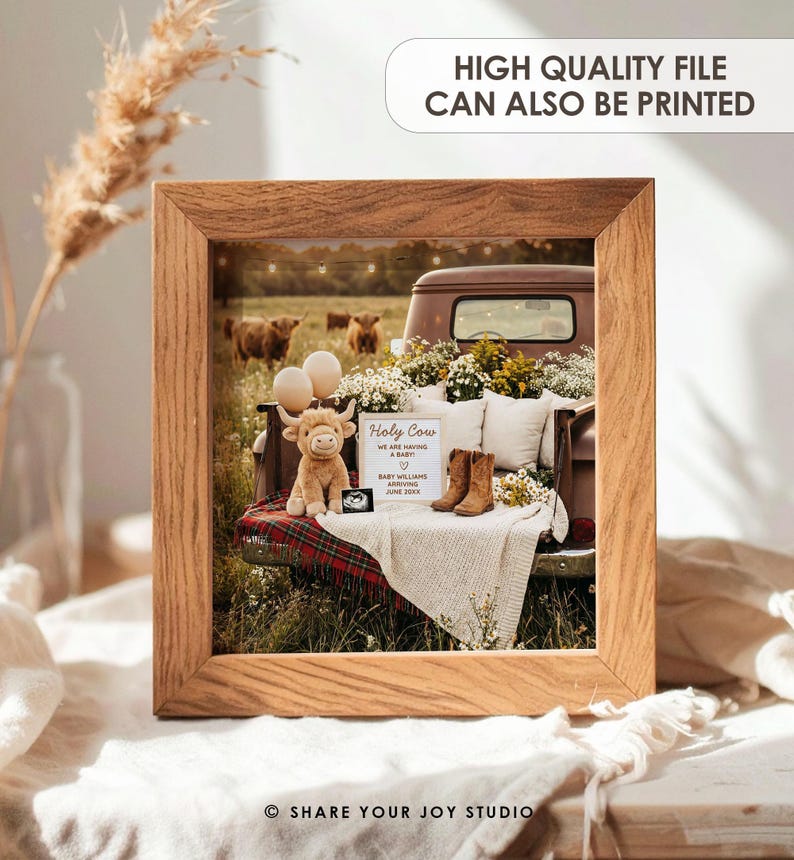May include: A framed print featuring a brown pickup truck bed filled with flowers, pillows, and a plush cow toy. The bed also holds a sign that reads "Holy Cow, We Are Having a Baby." Two balloons and a pair of brown boots are also visible.