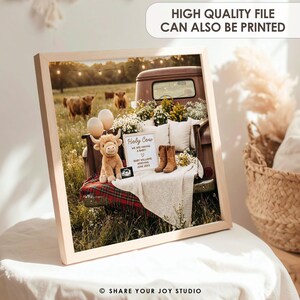 May include: A framed photograph featuring a vintage truck bed filled with flowers, pillows, and a sign that reads "Holy Cow We Are Having A Baby." A stuffed cow, ultrasound photo, and boots are also present. The background shows cows in a field.