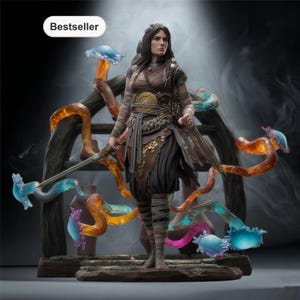 May include: A detailed figurine of a woman warrior holding a sword, standing in front of a wooden structure with colorful, twisting vines. The figure is dressed in brown and black attire with gold accents. The word "Bestseller" is in a white oval in the upper left corner.