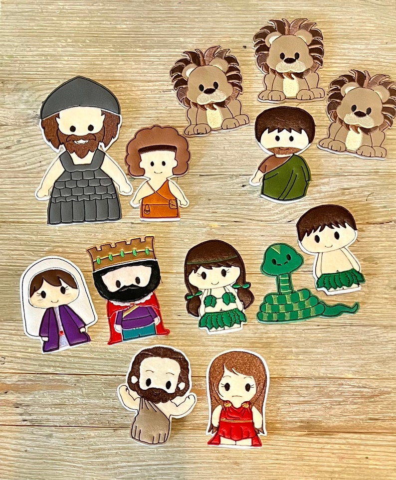Old Testament finger puppet set. Includes Ester and the King, Daniel and the Lions Den, David and Goliath, Adam and Eve, Samson and Delilah. image 1