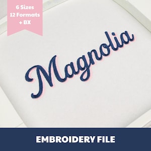 May include: An embroidery file design featuring the word Magnolia in a dark blue cursive script with a light pink outline. A pink banner in the top left corner displays the text 6 Sizes 12 Formats + BX. The bottom dark blue bar reads EMBROIDERY FILE.