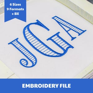 May include: An embroidery file featuring the blue stitched letters JGA in a serif font with horizontal line detailing. A blue banner in the upper left corner displays the text 6 Sizes 9 Formats + BX, while the bottom blue banner reads EMBROIDERY FILE.