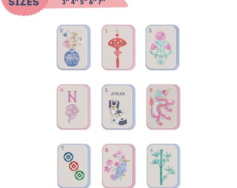 May include: Embroidery design set for machine embroidery, featuring nine unique designs on rectangular cards. The designs include floral arrangements, a dog, a dragon, and other decorative elements. The set is available in 5 sizes: 3", 4", 5", 6", and 7".