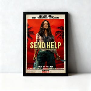 May include: A framed movie poster with a red and orange background. The poster features a woman holding a knife and a small object. The title "SEND HELP" is in gold lettering. The text "SHE'S THE BOSS NOW" is also visible.