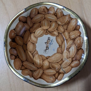 Four-Piece Lot of Mr. Peanut Metal Bowls, One Large & Three Small Bowls