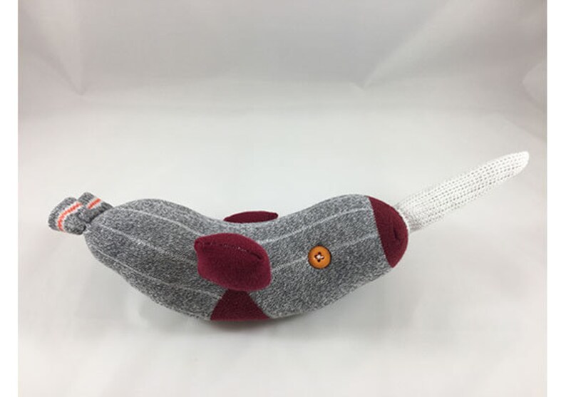 Narhwal gray, burgundy, and orange