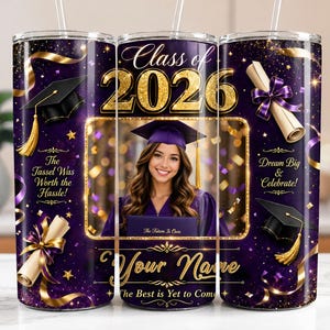May include: A personalized graduation tumbler with a purple and gold design. The tumbler features a photo of a graduate, the text "Class of 2026", and celebratory phrases. Includes a straw.