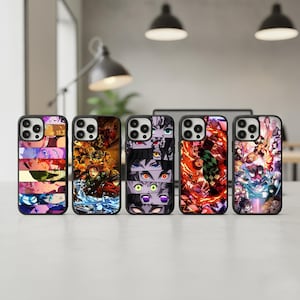 May include: Five black phone cases with colorful anime-style graphics. Each case features a different design, including characters and scenes from a popular animated series. The cases are displayed on a light-colored surface.