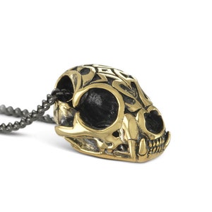 Lynx-schedelketting - bronzen lynx-schedelhanger met tribal design - dierenschedel