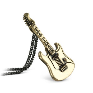 May include: A gold-colored electric guitar pendant necklace with a black chain. The guitar has a white body and black strings.