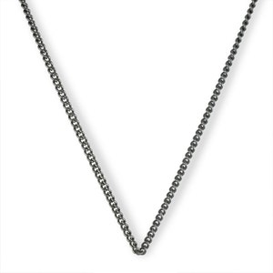 May include: A silver chain necklace with a curb link style.