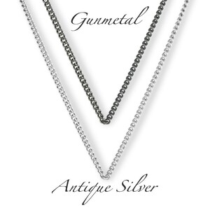 May include: Two chains, one silver and one gunmetal, are shown hanging against a white background. The silver chain is labeled "Antique Silver" and the gunmetal chain is labeled "Gunmetal".