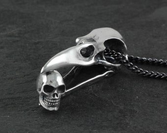Raven Skull with Human Skull Necklace - Sterling Silver Raven Skull Pendant