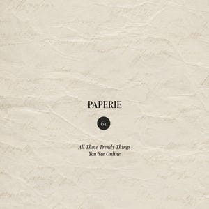 May include: A beige, textured paper background featuring faint, cursive handwriting. Centered text reads PAPERIE, followed by a black circle containing the number 61, and the text All Those Trendy Things You See Online in a serif font.