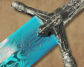 May include: A detailed close-up of a decorative sword. The hilt and crossguard are silver with intricate carvings. The blade is a vibrant turquoise with a swirling design. The overall aesthetic suggests a fantasy or historical theme.