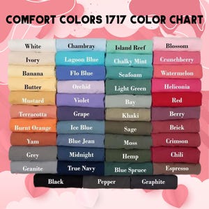May include: A color chart titled "COMFORT COLORS 1717 COLOR CHART" displays a variety of fabric colors. The colors include white, ivory, banana, butter, mustard, terracotta, burnt orange, yam, grey, granite, black, chambray, lagoon blue, flo blue, orchid, violet, grape, ice blue, blue jean, midnight, true navy, pepper, island reef, chalky mint, seafoam, light green, bay, khaki, sage, moss, hemp, blue spruce, graphite, blossom, crunchberry, watermelon, heliconia, red, berry, brick, crimson, chili, and espresso.