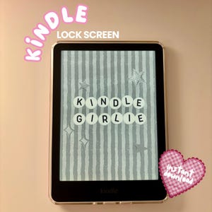 May include: A Kindle e-reader showing "KINDLE GIRLIE" on the screen, set against a grey striped backdrop. The words "KINDLE" and "LOCK SCREEN" are above the screen. A pink heart with "instant download" is in the corner.