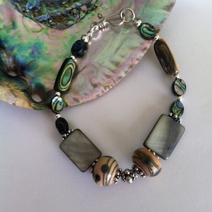 Abalone Shell Bracelet Green Paua and Lamp Work Glass Beaded Handmade Jewelry With Fancy Sterling Silver Spacer Beads Earth and Sea Colors