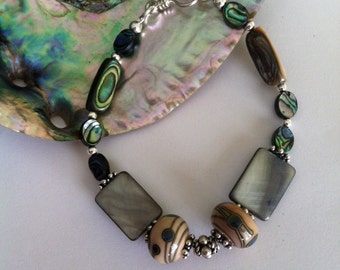 Abalone Shell Bracelet Green Paua and Lamp Work Glass Beaded Handmade Jewelry With Fancy Sterling Silver Spacer Beads Earth and Sea Colors