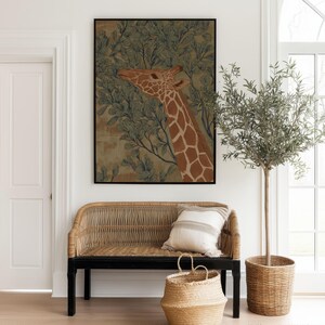 Nature-style giraffe portrait in green and brown with leafy stems, soothing vintage mood, displayed as a framed poster above a woven bench in a bright entryway.