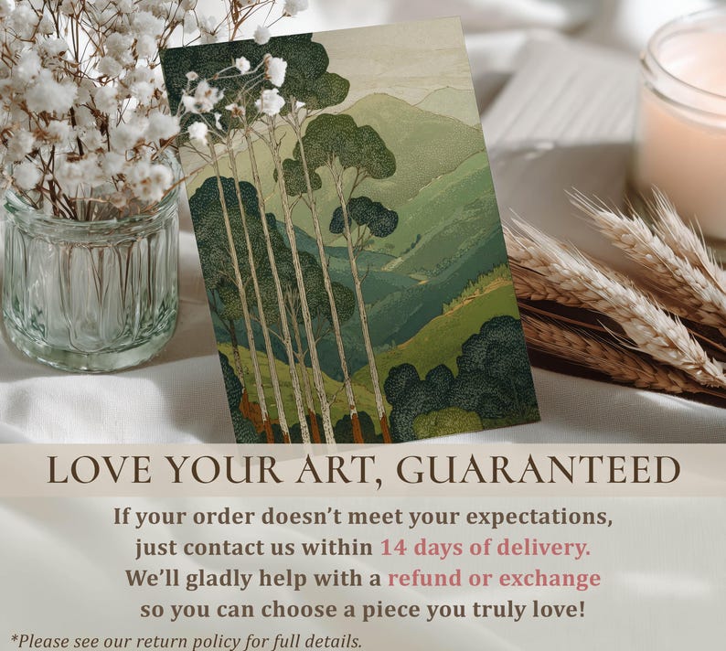 Tall trees and layered green mountains in a calm, vintage-style wall art print, styled on a tabletop with florals and a 14-day guarantee overlay.
