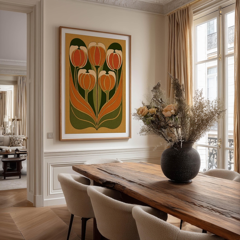 Retro floral tulip motif in orange and green tones wall art print hanging above a wooden dining table in an elegant dining room.