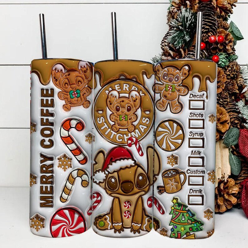 May include: Three stainless steel tumblers with a Christmas theme. The tumblers feature a gingerbread Stitch design, candy canes, snowflakes, and the words "Merry Coffee" and "Merry Stitchmas". Each tumbler has a silver straw.