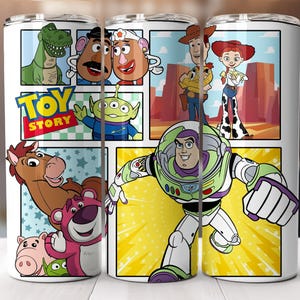 May include: A white tumbler featuring a collage of characters from the animated film "Toy Story." The design includes images of Buzz Lightyear, Woody, Jessie, and other characters. The "Toy Story" logo is also visible.