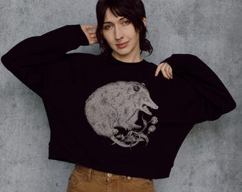 Sudadera negra con cuello redondo y estampado floral de tulipanes de The Possum