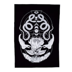 May include: A black and white illustration with a mystical theme. It features two snakes, a flower, and hands. The snakes are symmetrically placed above the flower, with a geometric design and an eye at the top. The artwork has a spiritual theme.