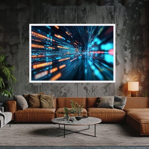 May include: A framed digital art print showcasing an abstract design of data streams in blue, orange, and white. The artwork is displayed in a modern living room with a brown leather sofa and a round coffee table, creating a contemporary feel.