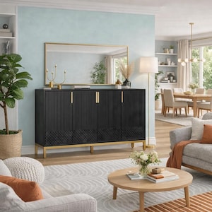 May include: A black cabinet with gold accents and four doors. The cabinet has a textured design on the doors and sits on gold legs. A gold-framed mirror hangs above the cabinet, reflecting the room.