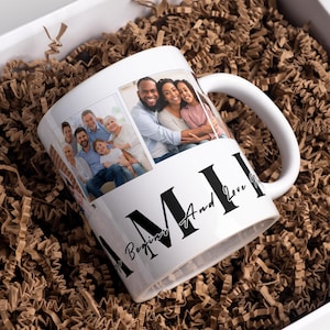 May include: White ceramic mug featuring family photos and the text "My Beginnings And Love". The mug has a large handle and is presented in a white gift box with brown paper filler. The photos show a diverse group of people.