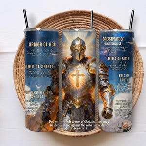 May include: A set of three stainless steel tumblers with black straws, featuring a design of a knight in shining armor with a cross. The tumblers are decorated with text about the Armor of God.