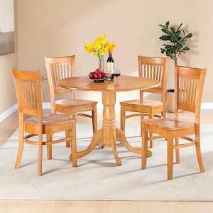 May include: A trio of ceramic mugs with a speckled, matte finish in cream, light brown, and dark brown. Each mug has a simple, minimalist design and a rounded handle. Suitable for tea or coffee, these mugs offer a rustic aesthetic.