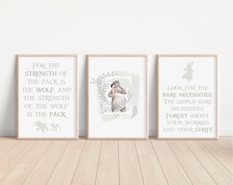 May include: Three framed art prints with light wood frames. The prints feature quotes in a soft green font. One print reads "For the strength of the pack is the wolf, and the strength of the wolf is the pack." The other two prints have different quotes.