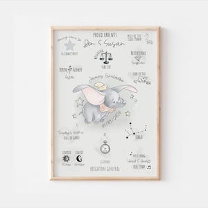 May include: A framed print featuring a whimsical illustration of Dumbo the elephant, with the name "James Sinclair" and birth details. The print includes the text "Proud Parents Ben & Susan" and other birth information.