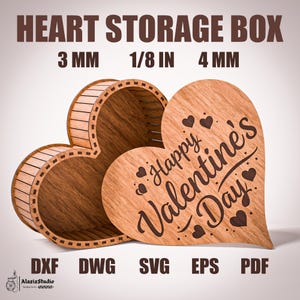 Pode incluir: Uma caixa de armazenamento em forma de coração de madeira com uma tampa, gravada com "Happy Valentine's Day". A caixa é feita de madeira castanha clara e tem um design decorativo. O texto "HEART STORAGE BOX" e as dimensões também são visíveis.