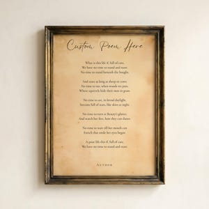 May include: A framed wall art piece featuring a vintage-style parchment background with dark brown text. The print displays the title Custom Poem Here, the poem Leisure by W.H. Davies, and the word AUTHOR at the bottom, all encased in a dark frame.