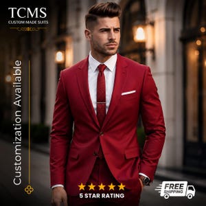 May include: A deep red suit jacket worn over a crisp white collared shirt and a textured red tie with a silver tie bar. The jacket features a notched lapel, two front buttons, and a white pocket square. Text reads TCMS CUSTOM MADE SUITS.
