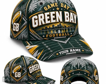 May include: A dark green baseball cap featuring the text "GAME DAY GREEN BAY FOOTBALL" and a city skyline graphic. The design includes a football field pattern on the brim, a football icon with "GB" text, and a customizable "YOUR NAME" area.