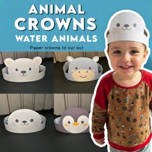 以下が含まれることがあります： ホッキョクグマ、カバ、アザラシ、ペンギンをあしらった紙製の動物クラウン。テキストには「ANIMAL CROWNS WATER ANIMALS Paper crowns to cut out」と書かれています。クラウンは白、グレー、紫で、漫画の動物の顔が描かれています。