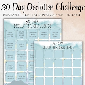 May include: Two printable 30 Day Declutter Challenge templates. The templates are light blue with a watercolor effect. The text includes "30 Day Declutter Challenge", "Printable", "Digital Download PDF", and "Editable in Canva". Each day has a decluttering task.
