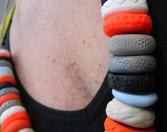 neon orange, white, pearl, black, baby blue, grey coral disk colour block necklace