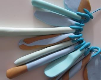 pastel blue and gold coloured 11 piece eclectic 'feather' necklace