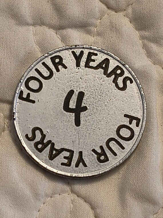 4 year sobriety coin made from a feau gold coin engraved.  I can paint them any color. I ship for exactly what it costs me.