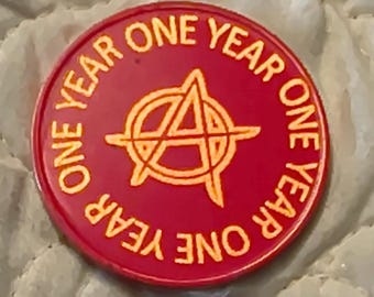 1 year sobriety coin made from a feau gold coin engraved.  I can paint them any color. I ship for exactly what it costs me.