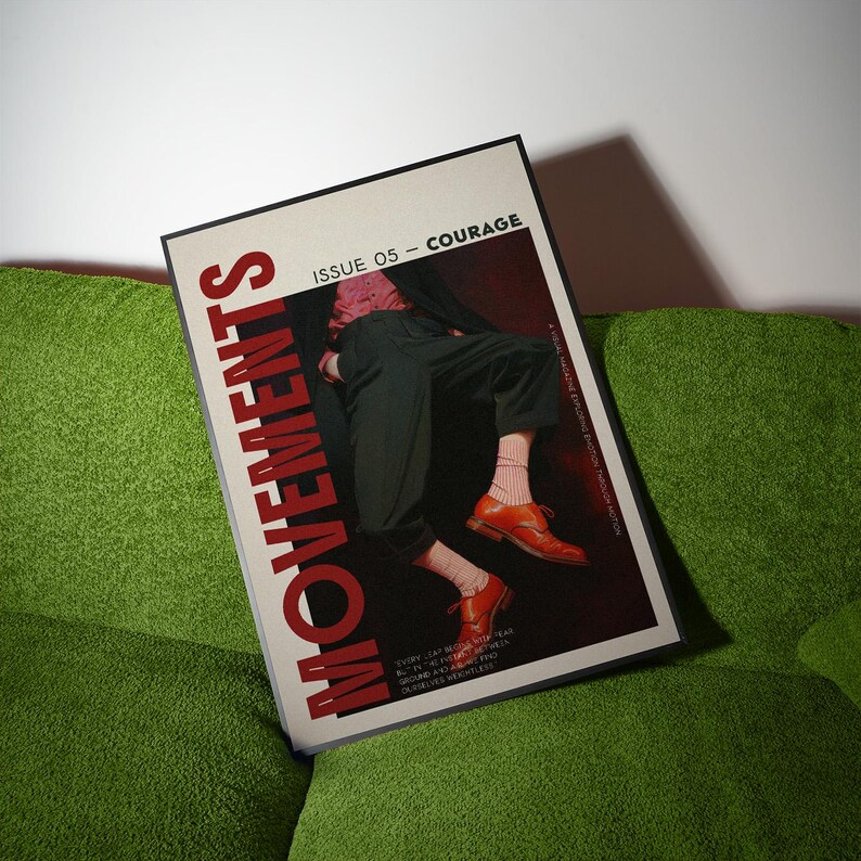 May include: A magazine titled "MOVEMENTS" with the text "ISSUE 05 - COURAGE" on a green couch. The magazine cover features a person wearing black pants, orange shoes, and pink socks. The magazine has a black border.