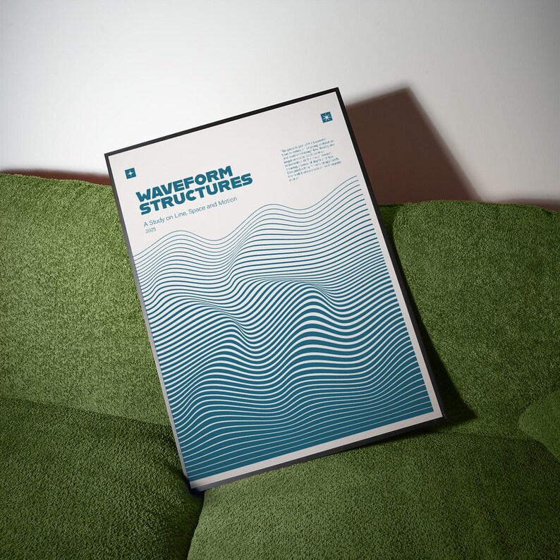 May include: A framed poster titled "WAVEFORM STRUCTURES" with a teal and white wave design. The poster is on a green couch. The text below the title reads "A Study on Line, Space and Motion 2020".