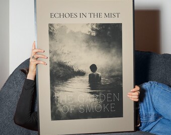 May include: A framed art print with the text "ECHOES IN THE MIST" and "THE GARDEN OF SMOKE". The artwork depicts a person in water, surrounded by mist. The frame is black, and the print has a neutral color palette.
